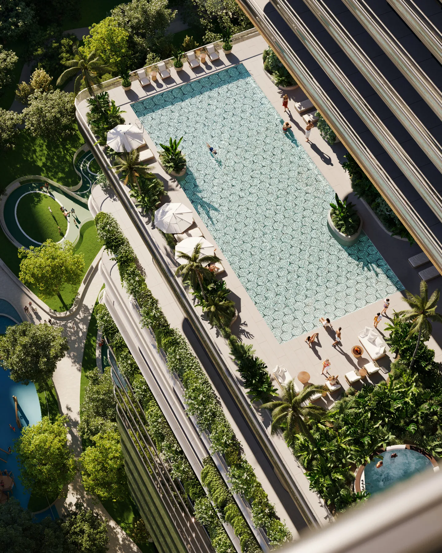 Aerial view of the pool deck and landscaped amenity level at Mercedes-Benz Places Miami