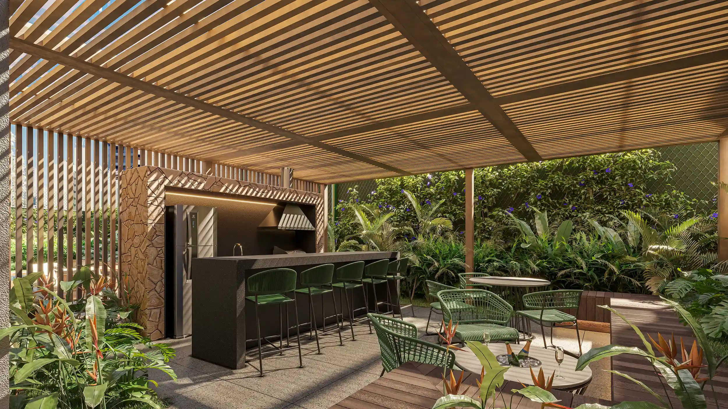 Espaço gourmet com churrasqueira no térreo do MAC Pinheiros, com bancada, banquetas e mesas para refeições ao ar livre