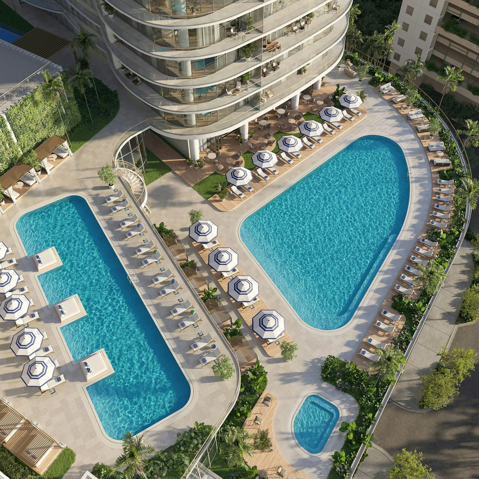 Aerial view of the two swimming pools and resort deck at Cipriani Residences Miami