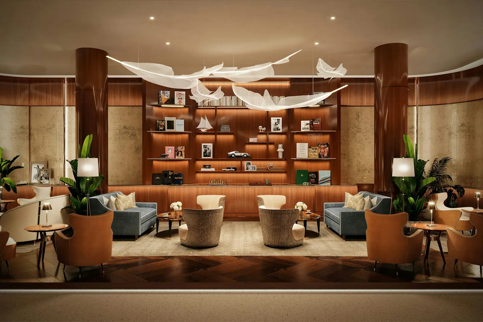 Residents' lounge with library shelving and armchairs at Cipriani Residences Brickell