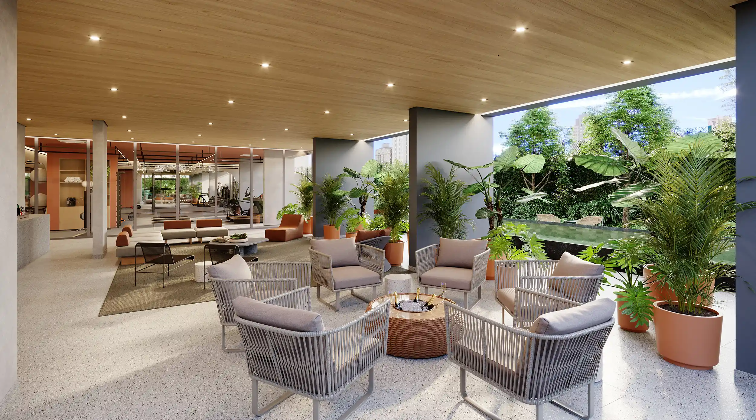 Segundo lounge da piscina do MAC Pinheiros, área de convivência ao ar livre com poltronas, vegetação e vista para a piscina