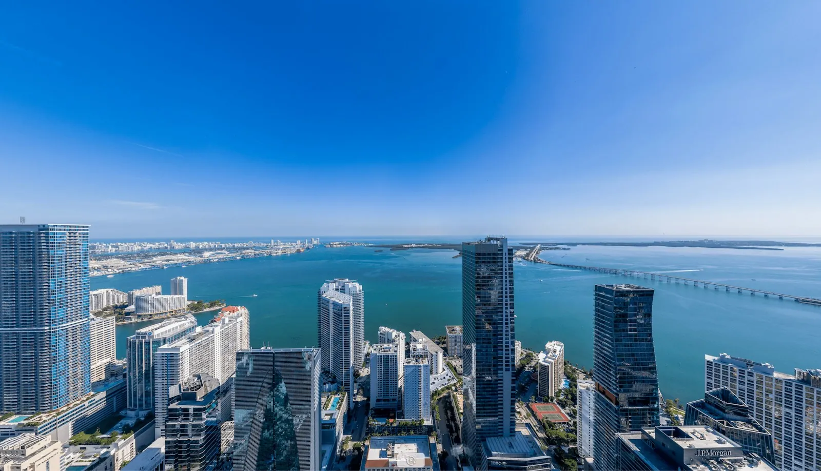 Cipriani Residences Miami tower rising over the Brickell skyline and Biscayne Bay