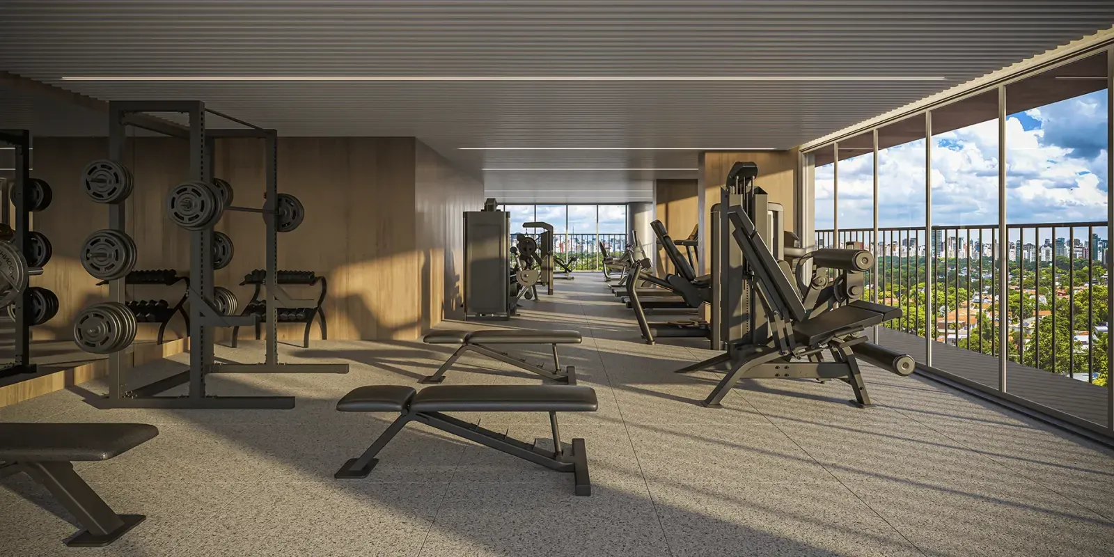 Sala de peso do VISAR Jardim Europa, com aparelhos de musculação e vista 180°